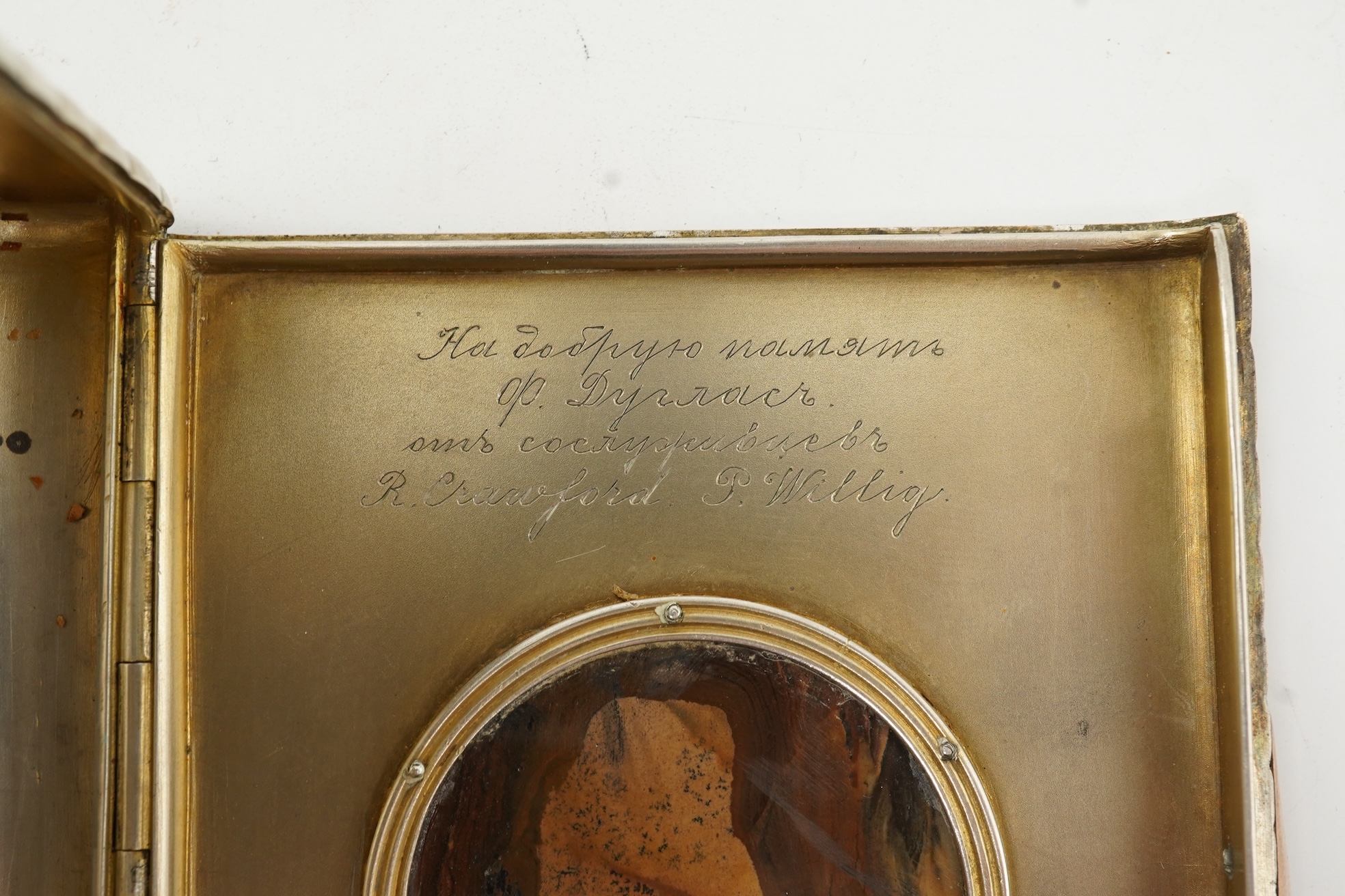 An early 20th century Russian 84 zolotnik silver cigarette case, with cappuccino agate inset cover, of ribbed rectangular form